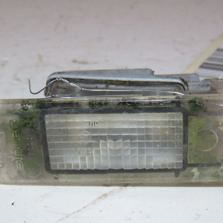 Eclaireur plaque de police g occasion  Renault MEGANE II (BM0/1_, CM0/1_) 1.9 dci (bm0g, cm0g) (2002-2008) 5 portes   7700796163 